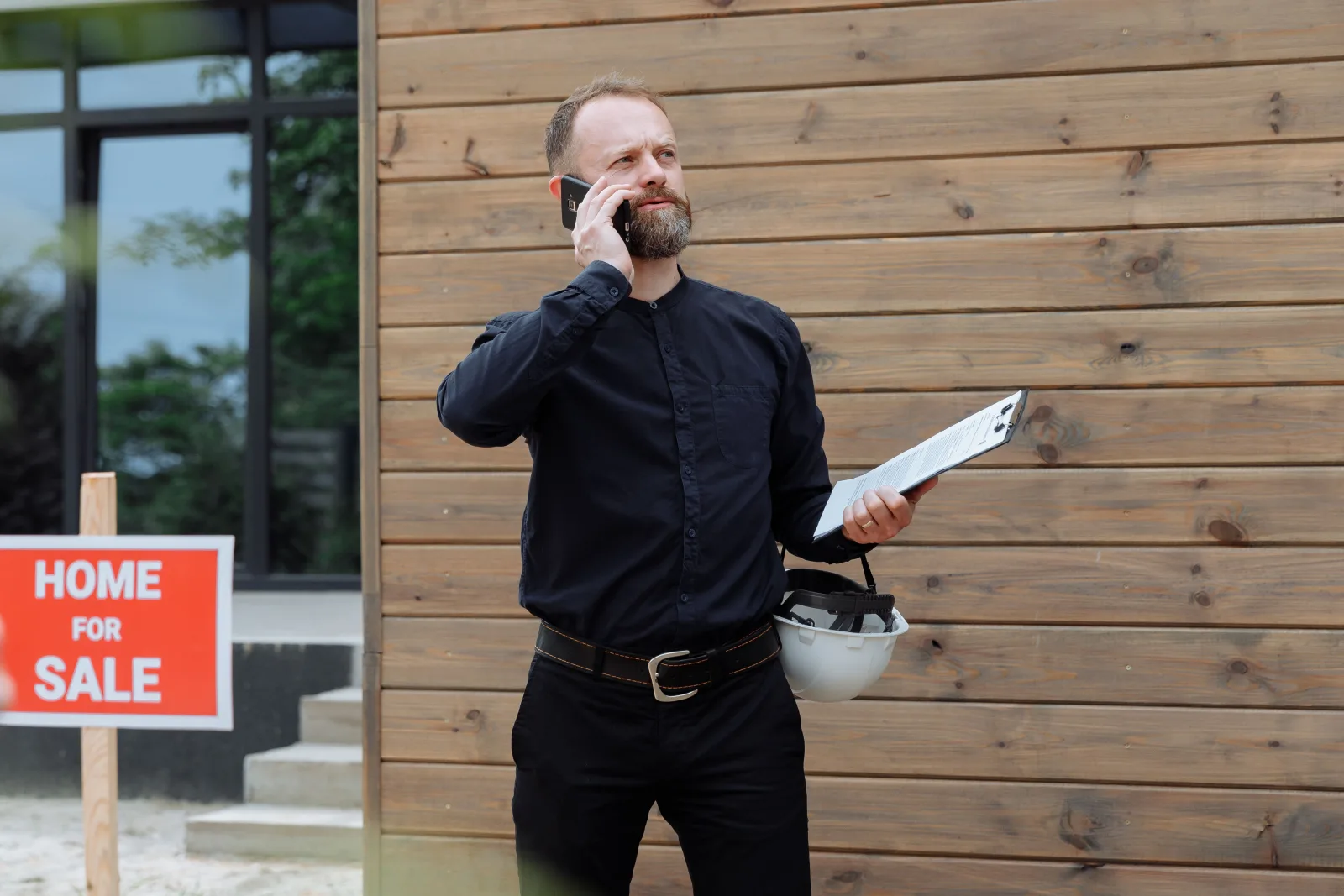 Photo of a man performing a house inspection.